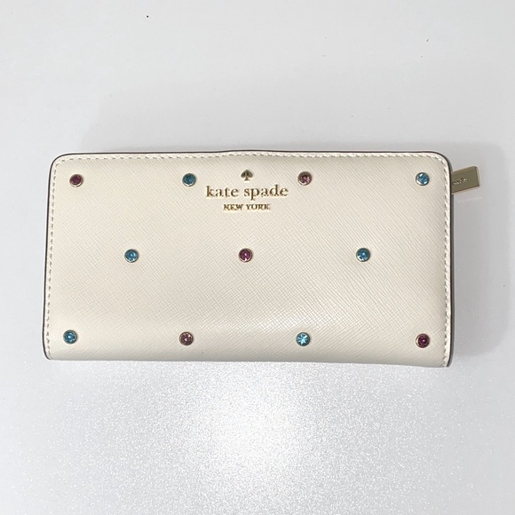 kate spade Handbags - Kate Spade Studded Large Slim Bifold Wallet in Meringue Madison NWT
